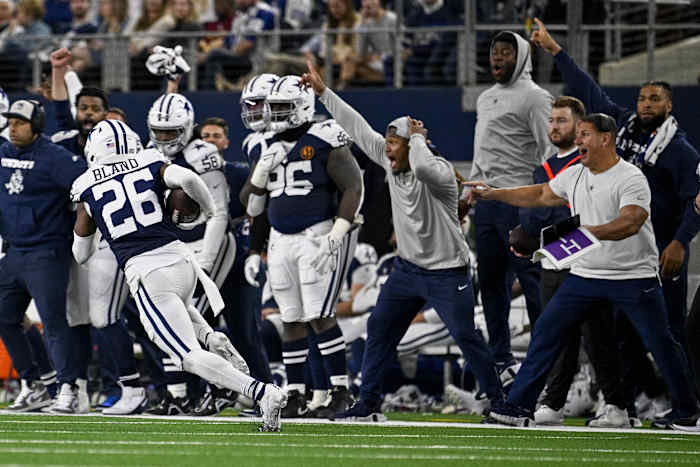 Nov 23, 2023; Arlington, Texas, USA; The Dallas Cowboys sideline reacts as cornerback DaRon Bland (26) returns an interception for a touchdown against the Washington Commanders during the second half at AT&T Stadium.